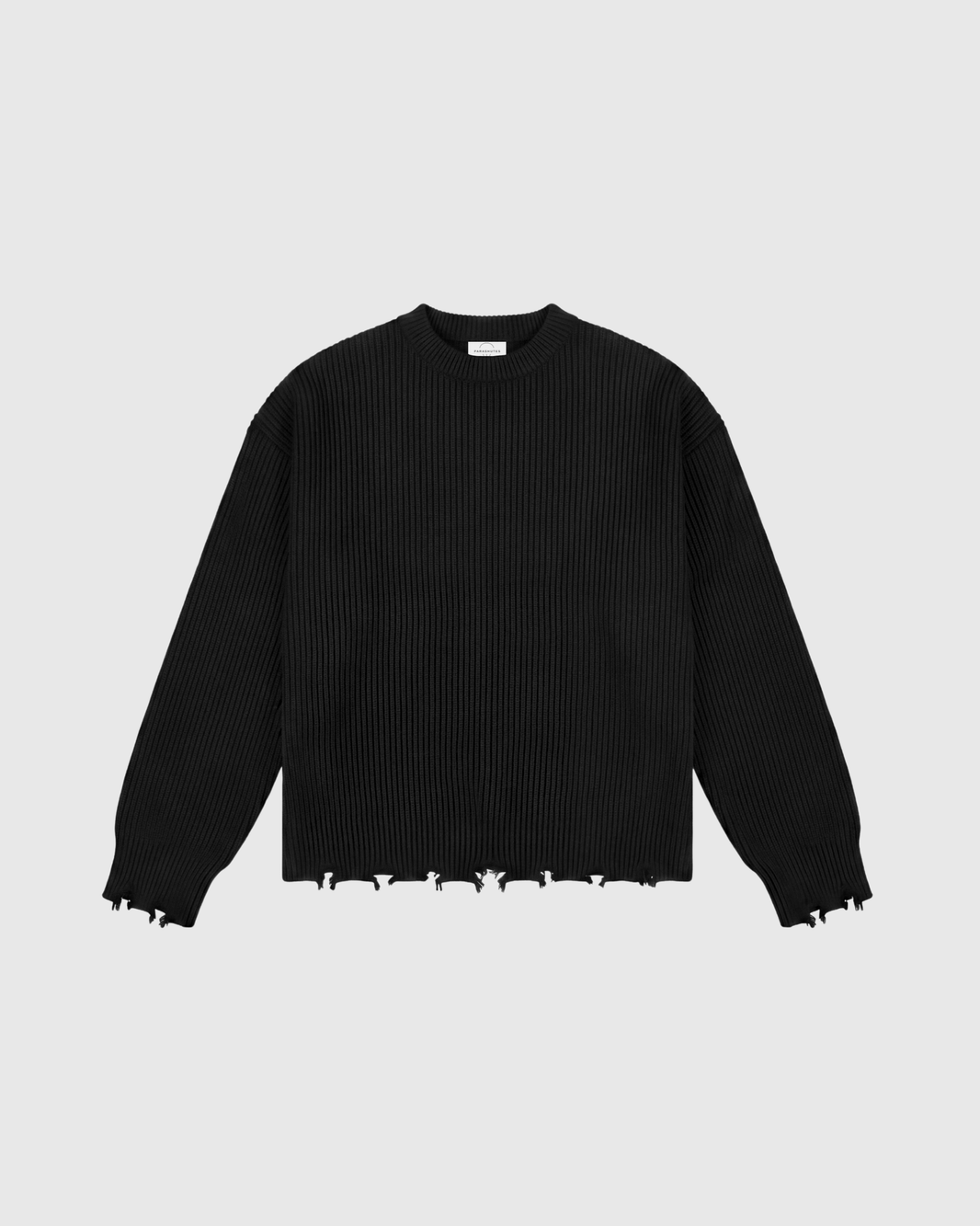 maglione con bordi destrutturati